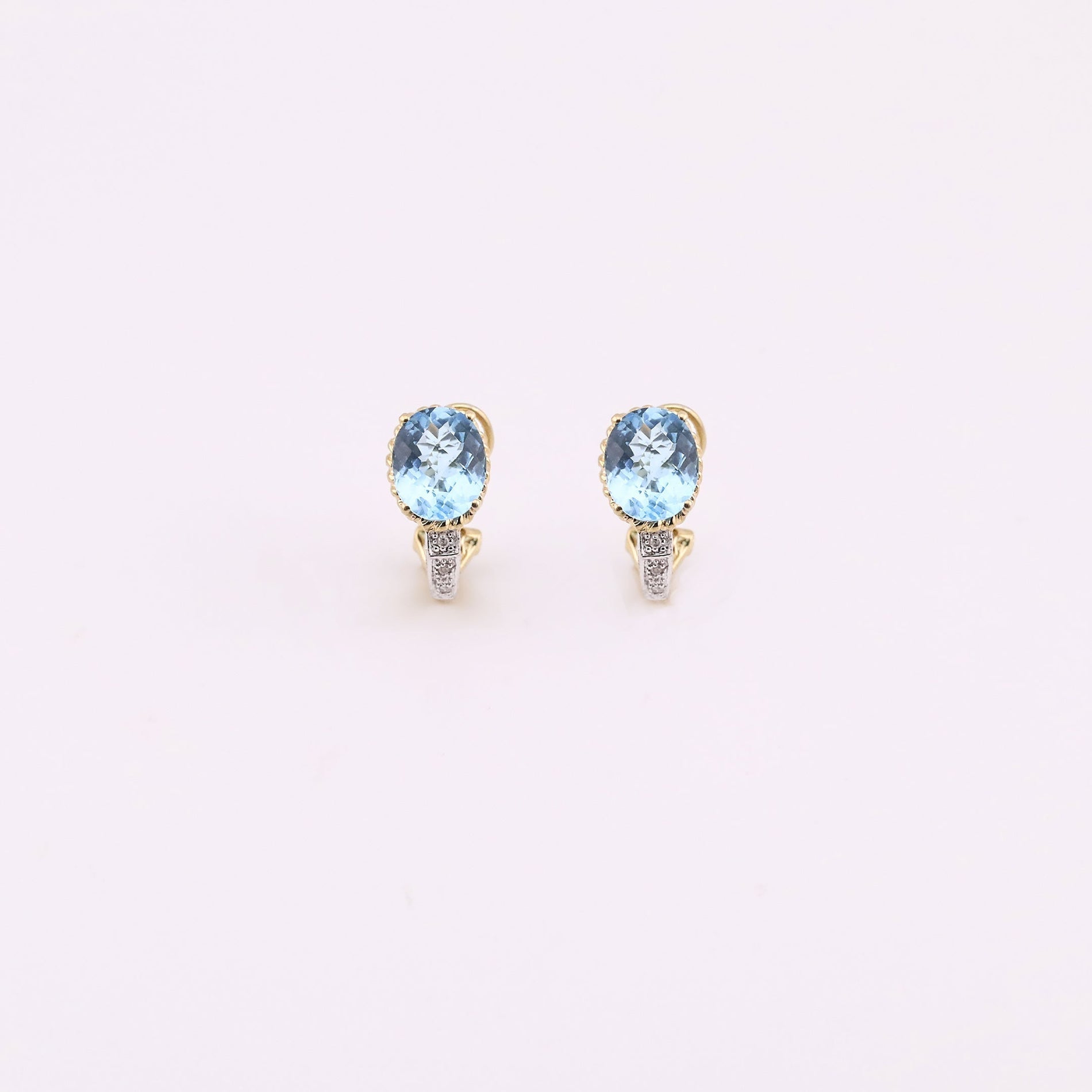Conjunto de Anillo y Aretes con Topacios y Diamantes