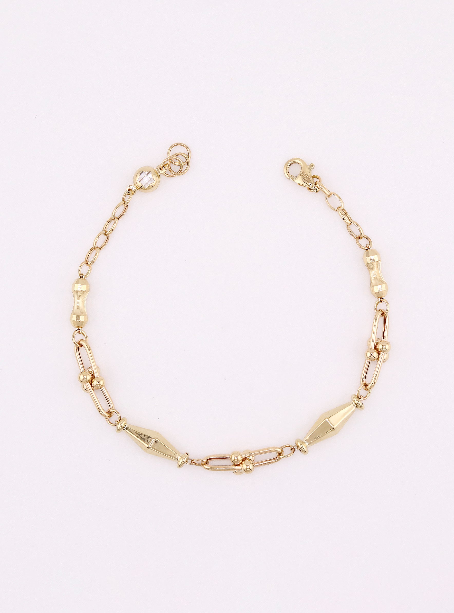 Pulsera de Oro Rombos y Borlas de 14K