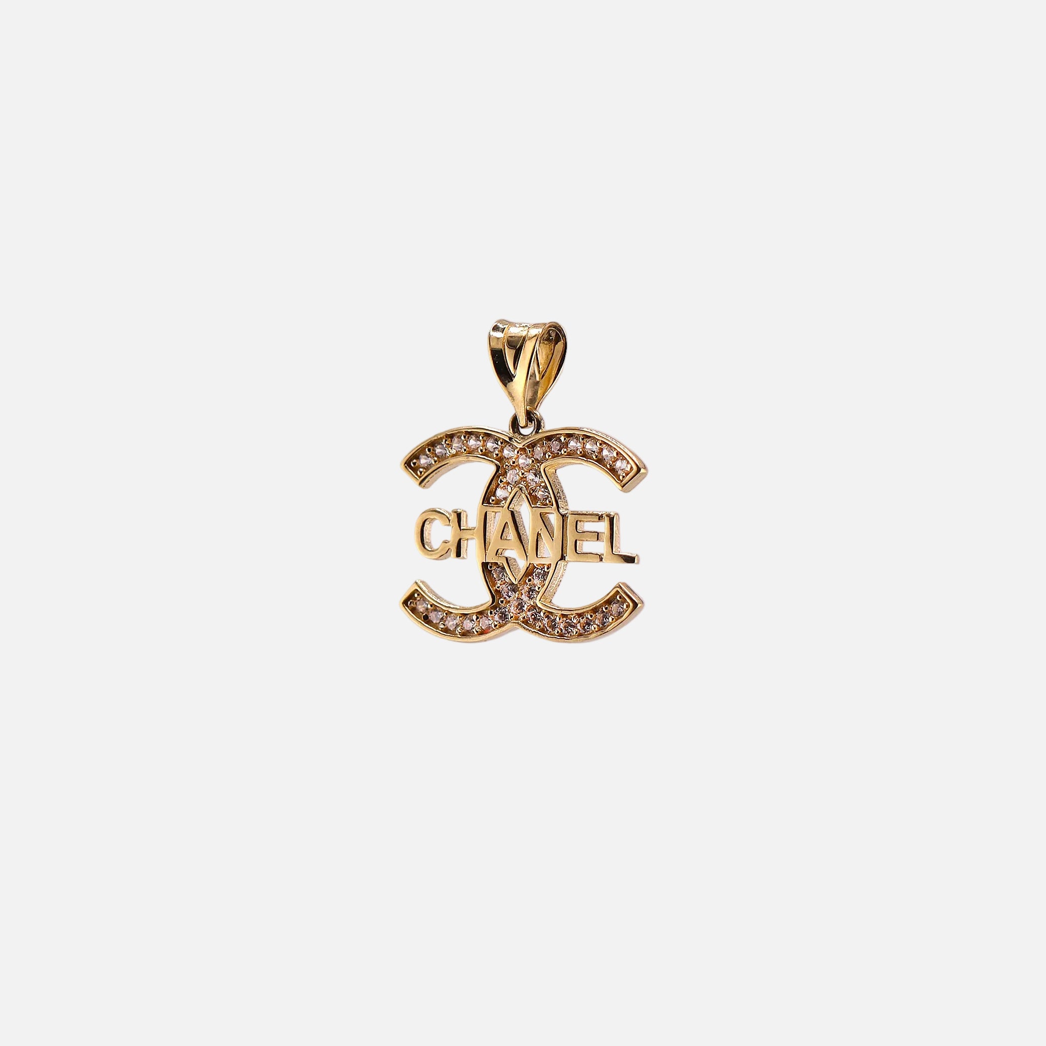 Dije Marca con Piedras Blancas en Oro de 14K