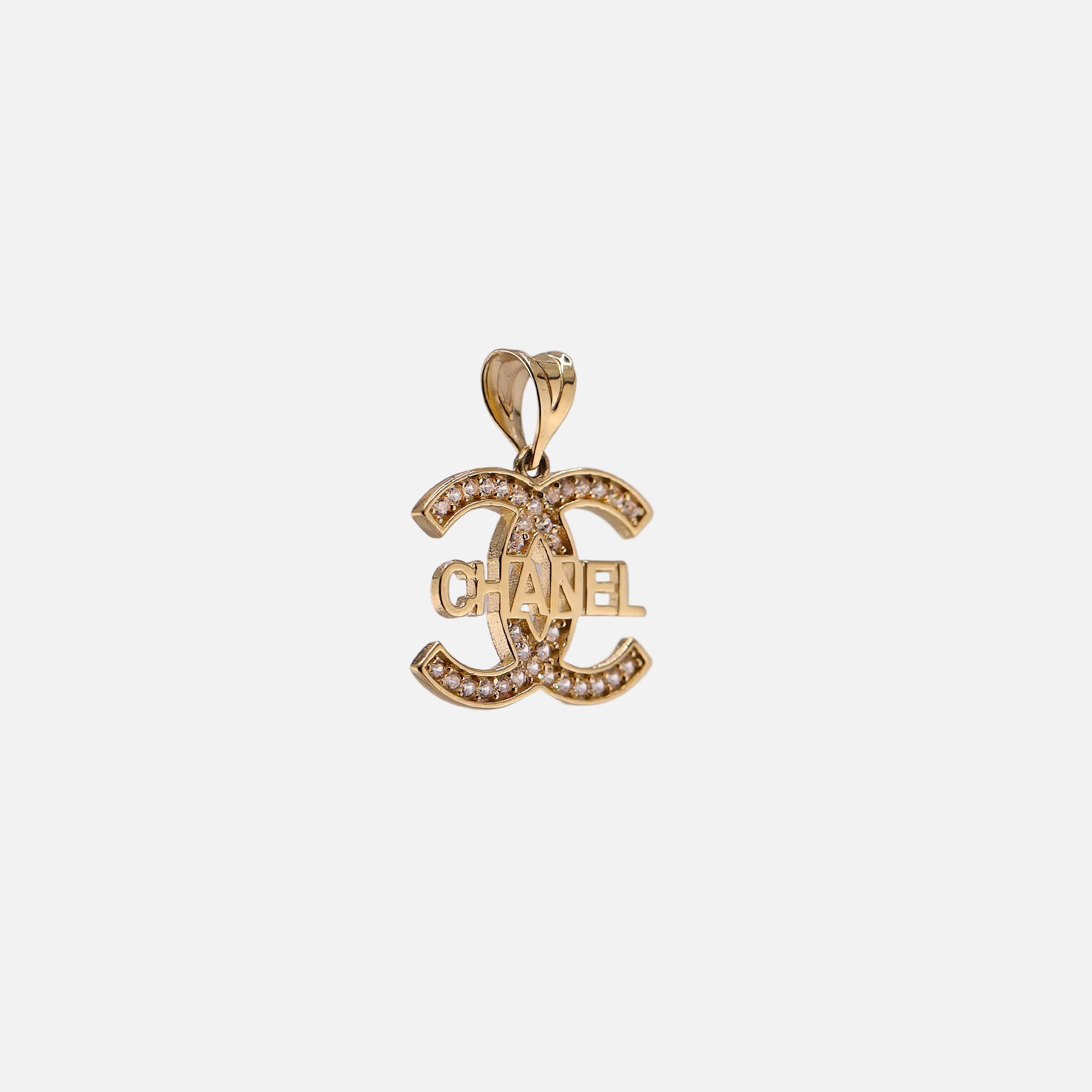 Dije Marca con Piedras Blancas en Oro de 14K