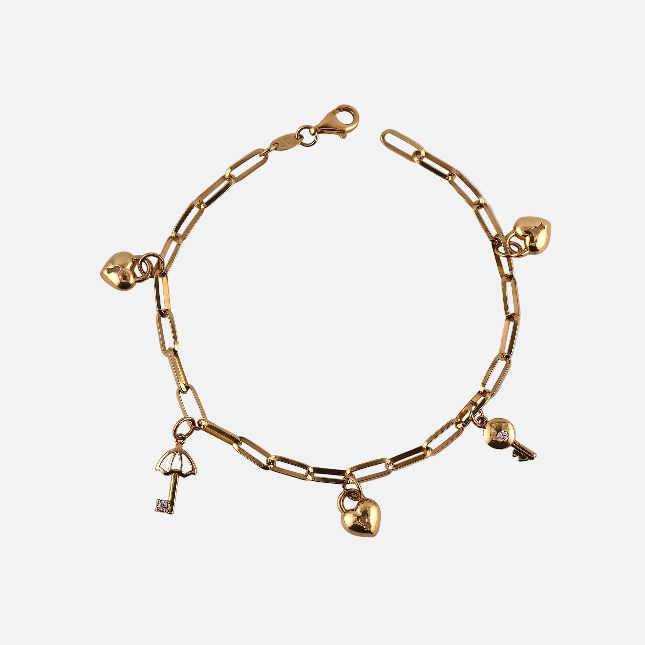 Pulsera Colgantes en Oro de 14K