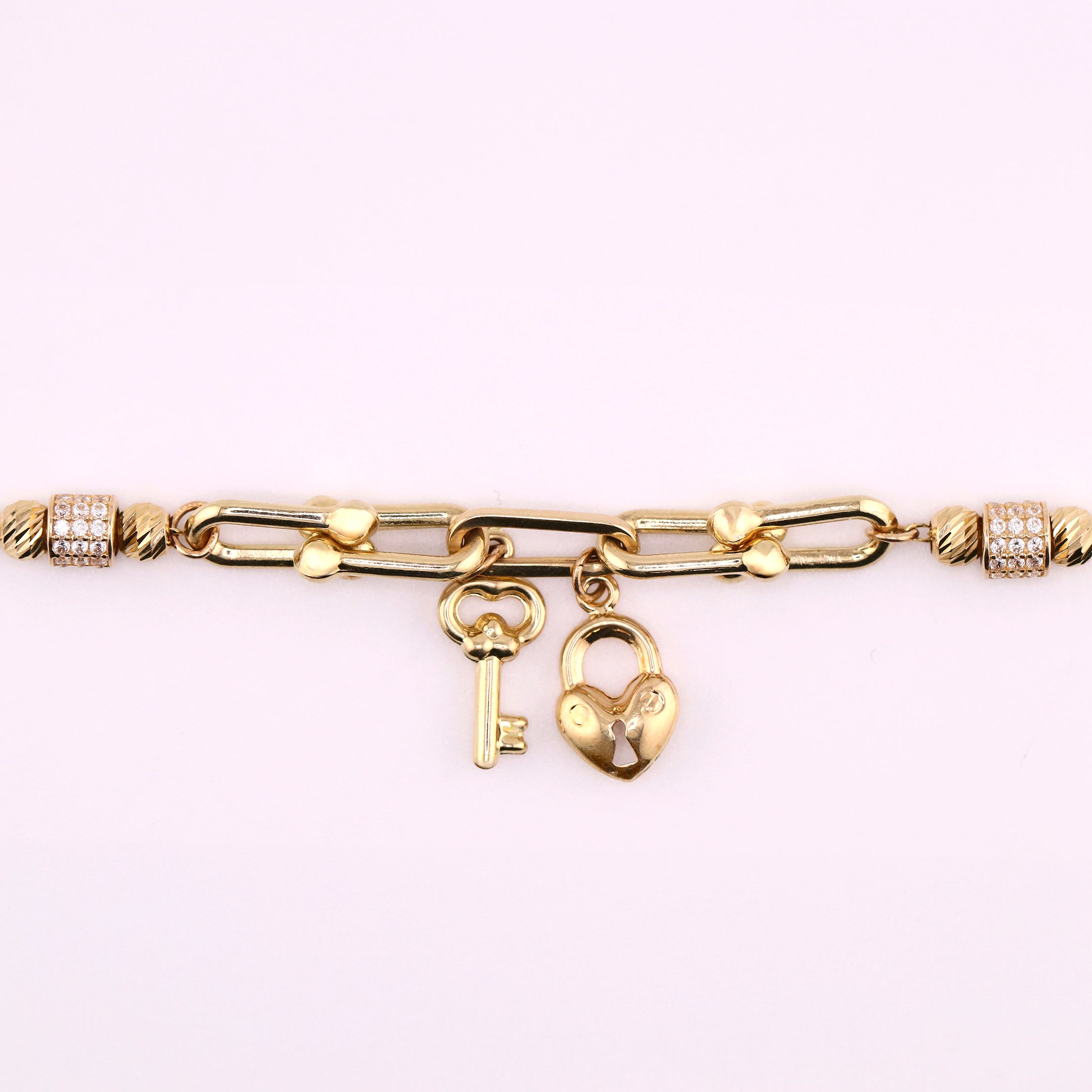 Pulsera Colgantes Llave y Corazón en Oro de 14K