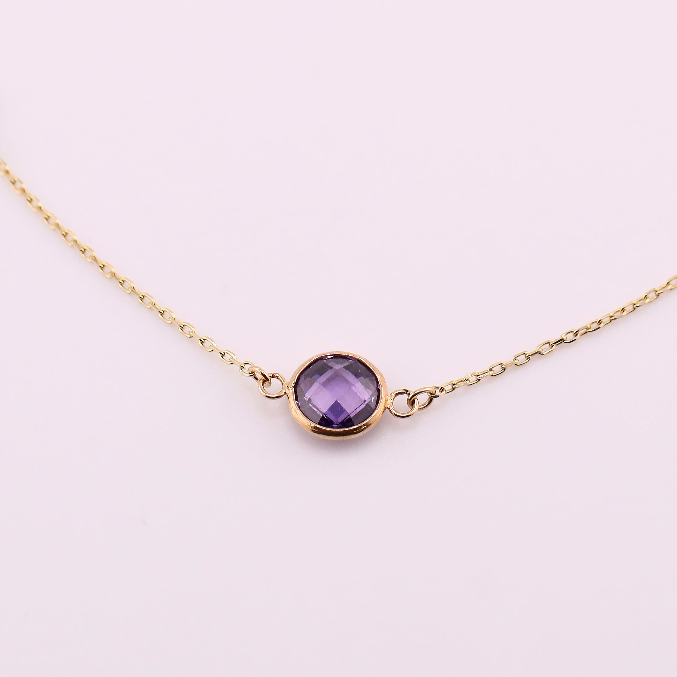 Pulsera con Piedra Morada en Oro de 14K
