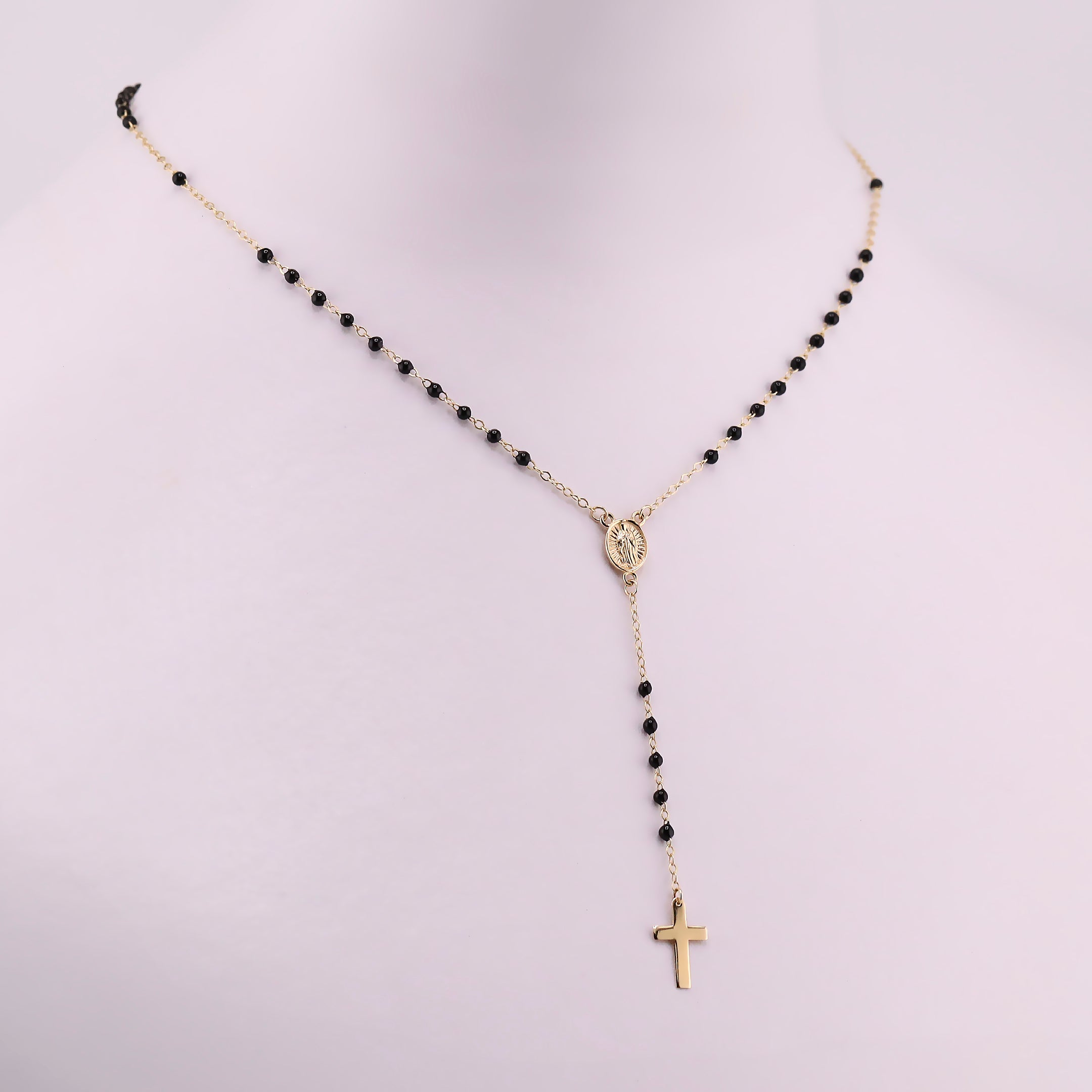 Rosario Piedras Negras en Oro de 14K