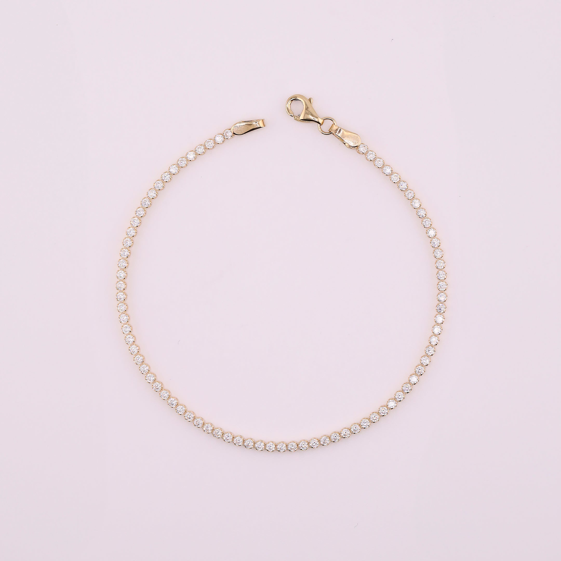 Pulsera Tennis Con Zirconias Blancas en Oro de 14K