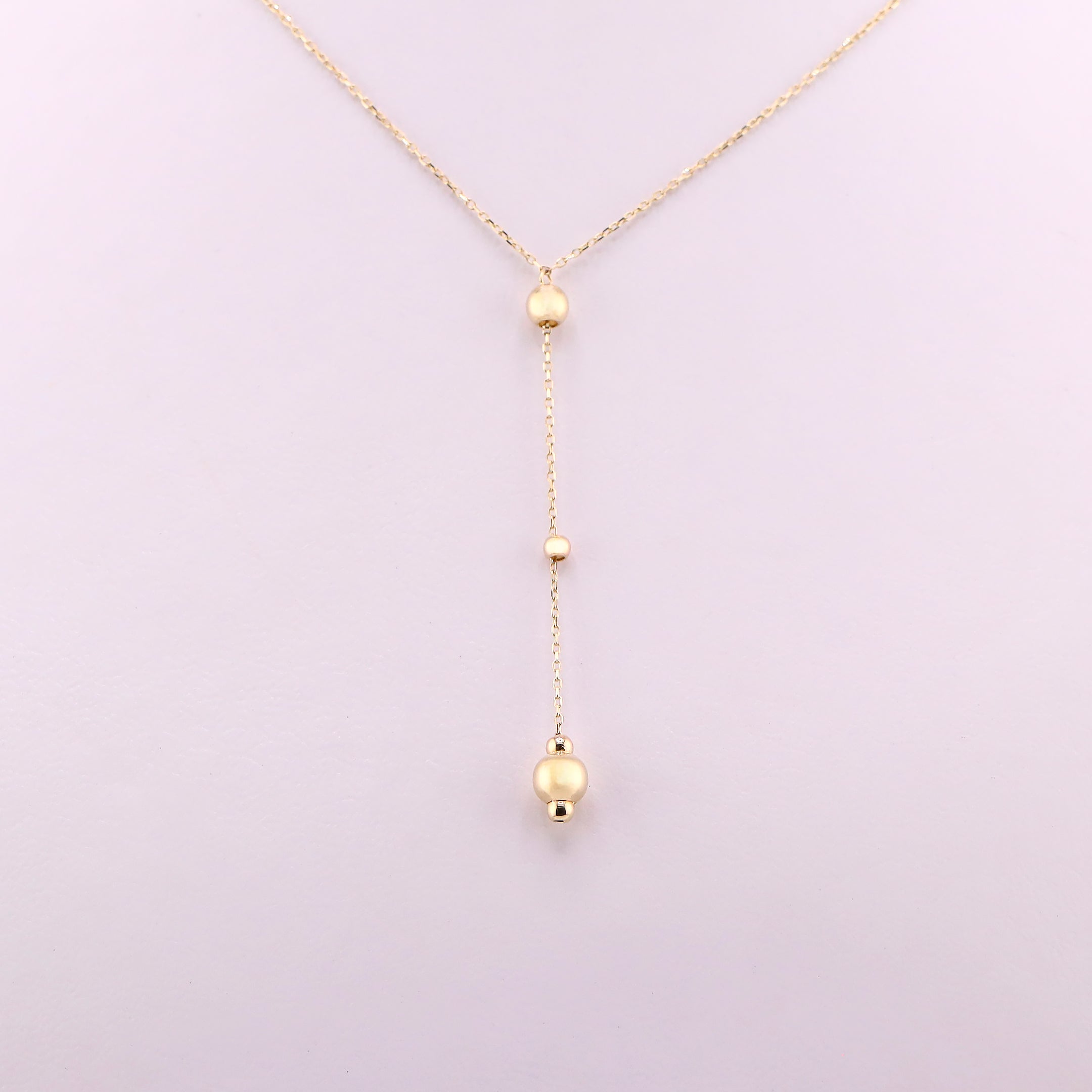 Gargantilla Corbatín Borlas en Oro de 14K