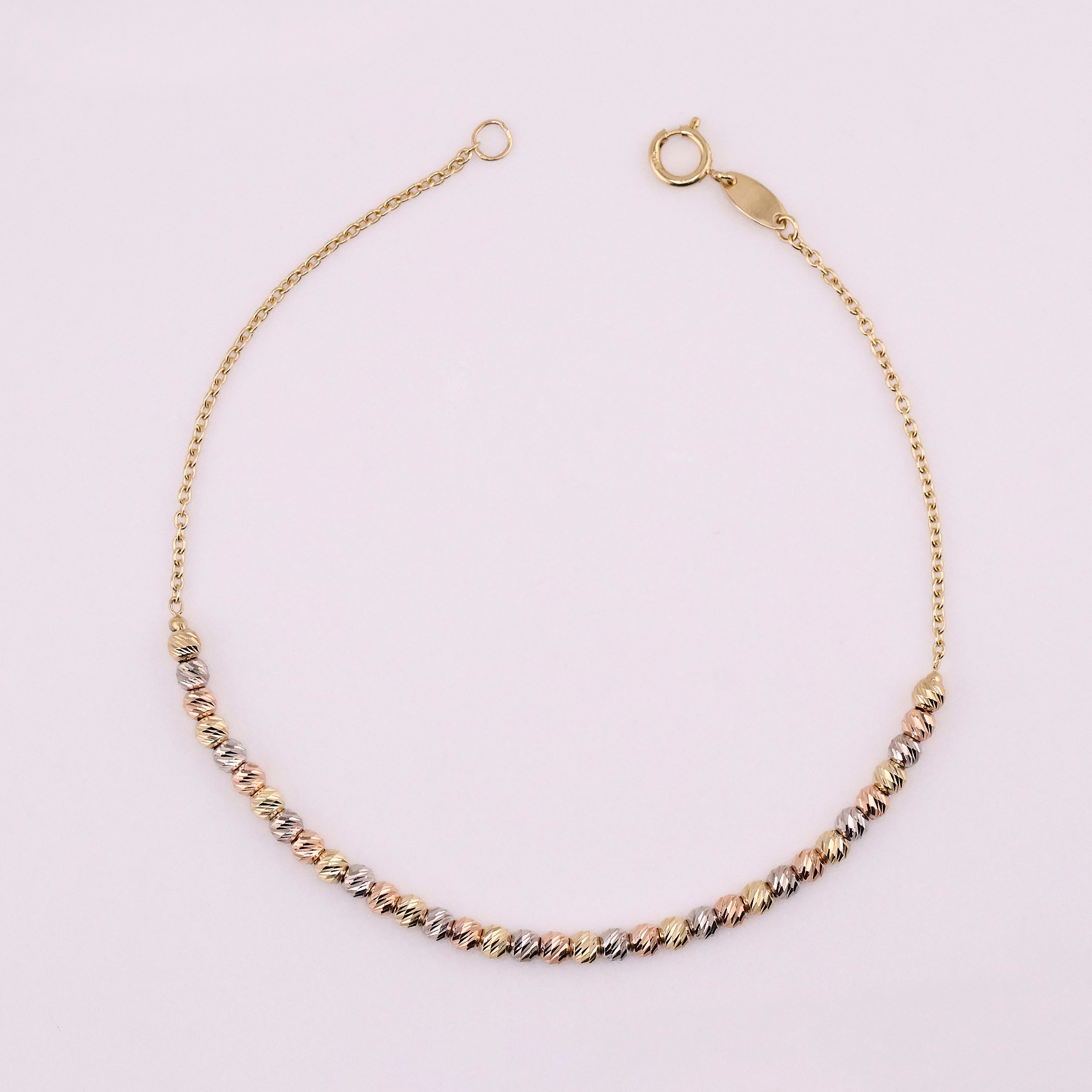 Pulsera de Oro Borlas en Tonos de 14K