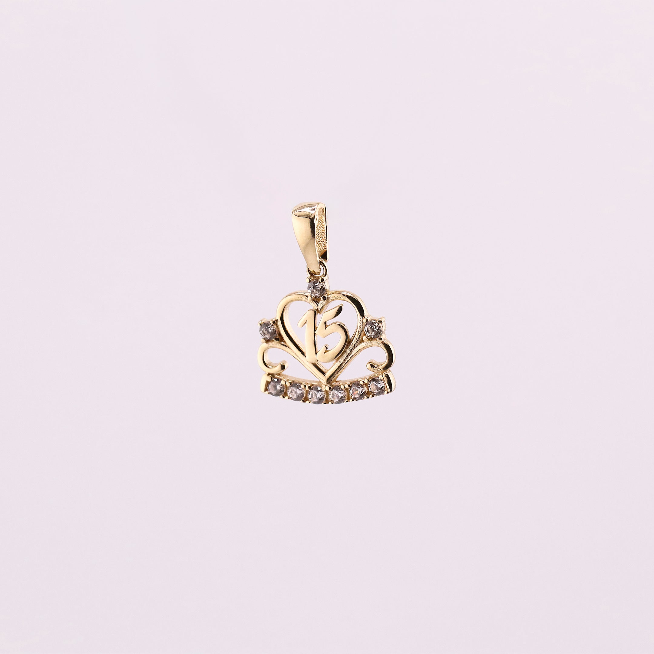 Dije XV años en Oro de 14K