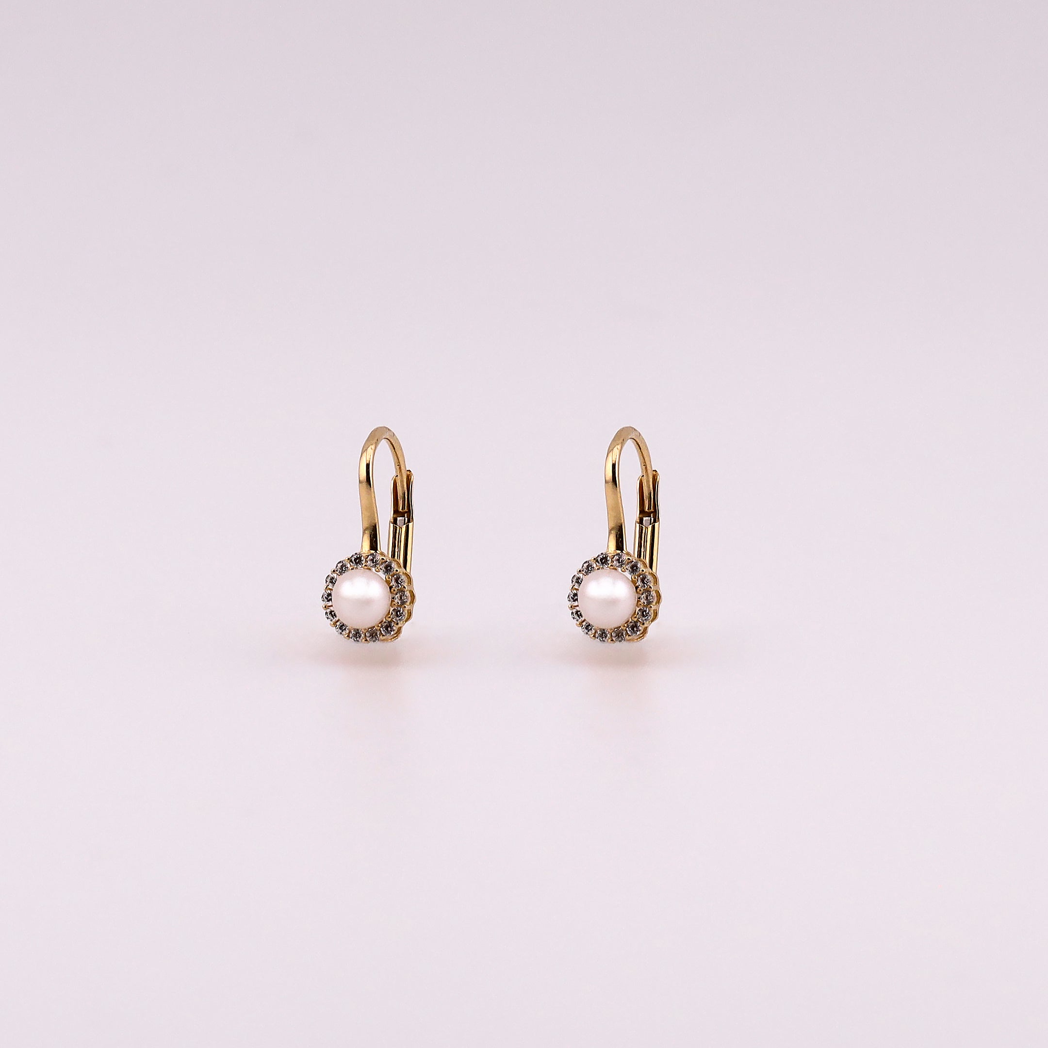 Aretes Huggies Perla en Oro de 14K