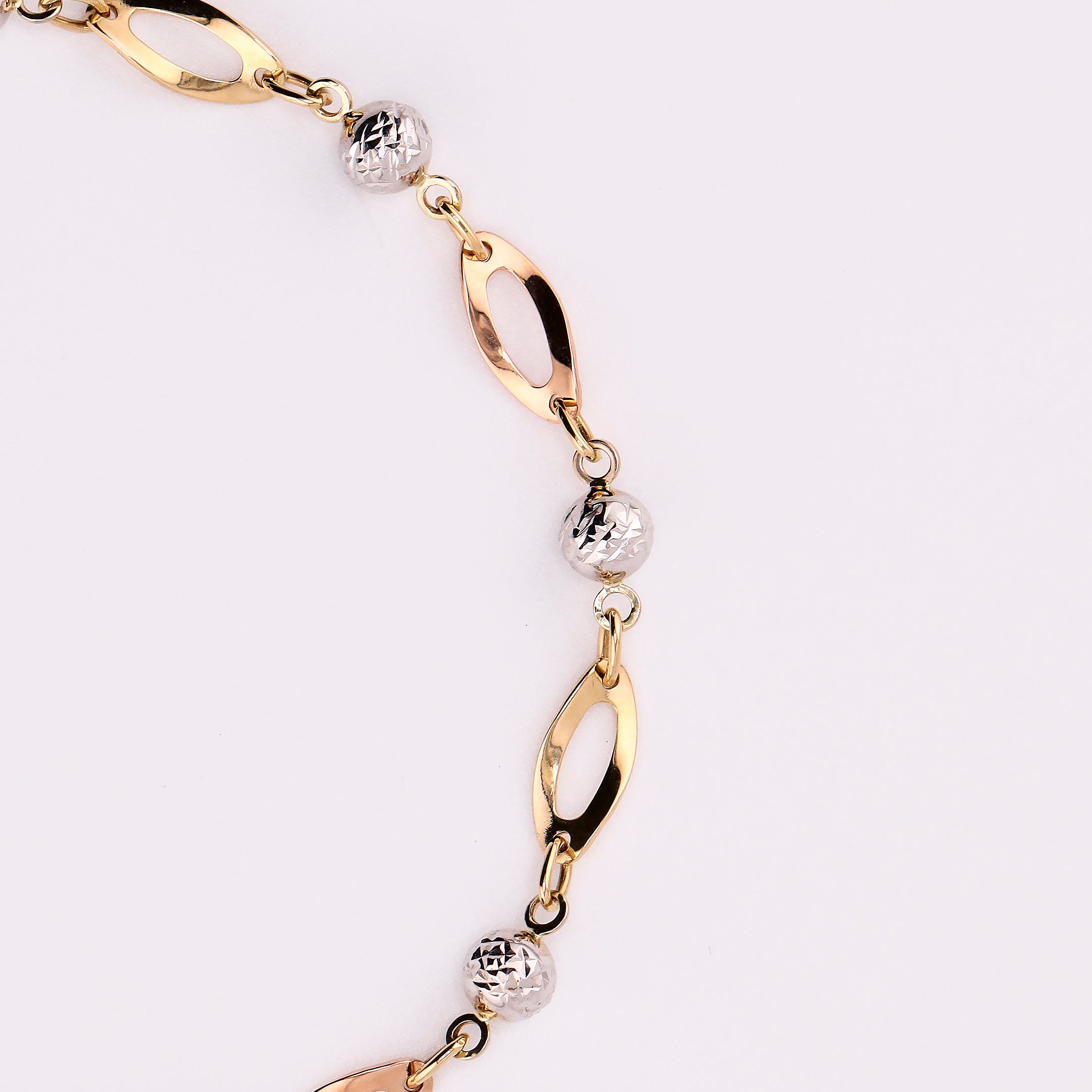 Pulseras Óvalos Borlas en Oro de 14K