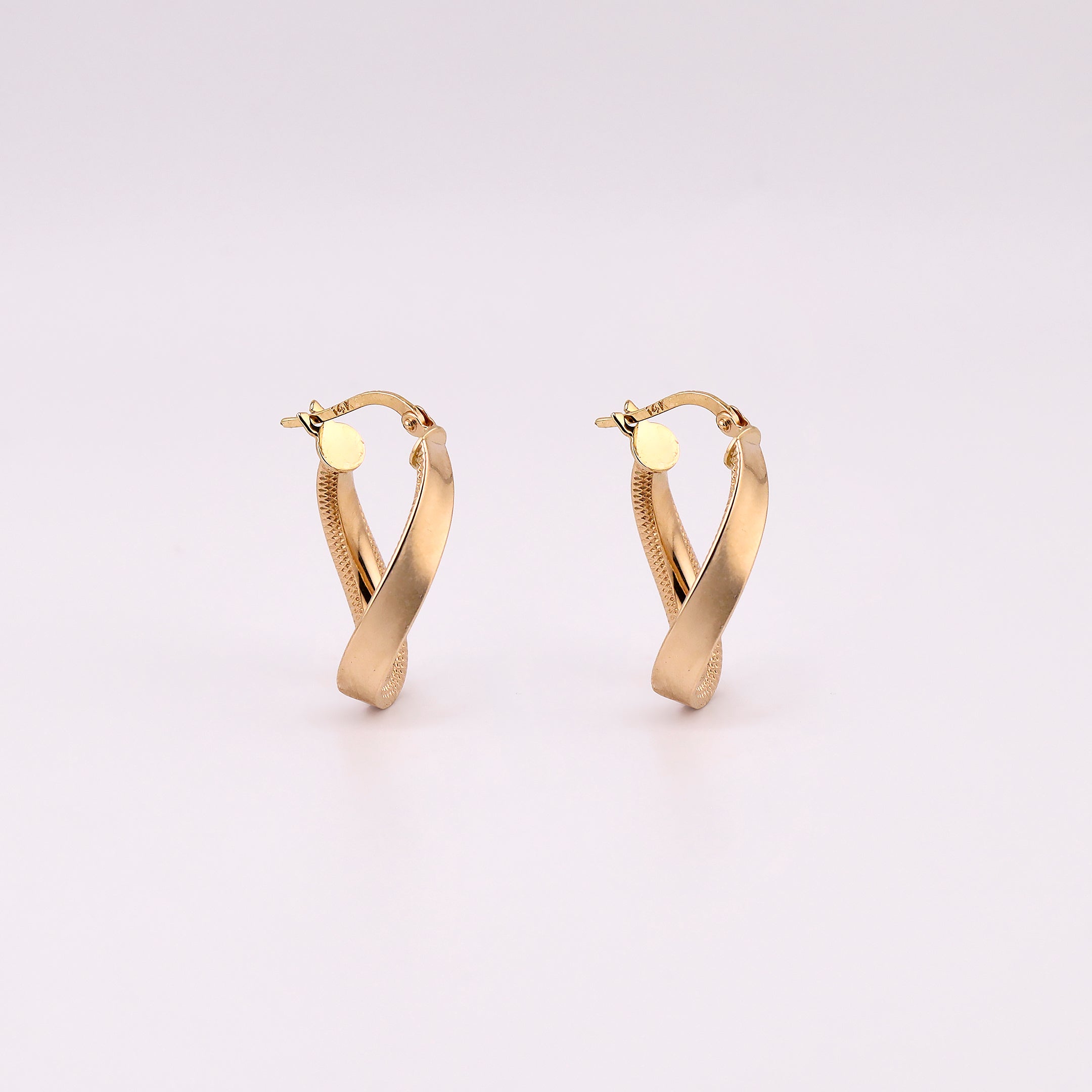 Arracadas Torcidas en Oro de 14K