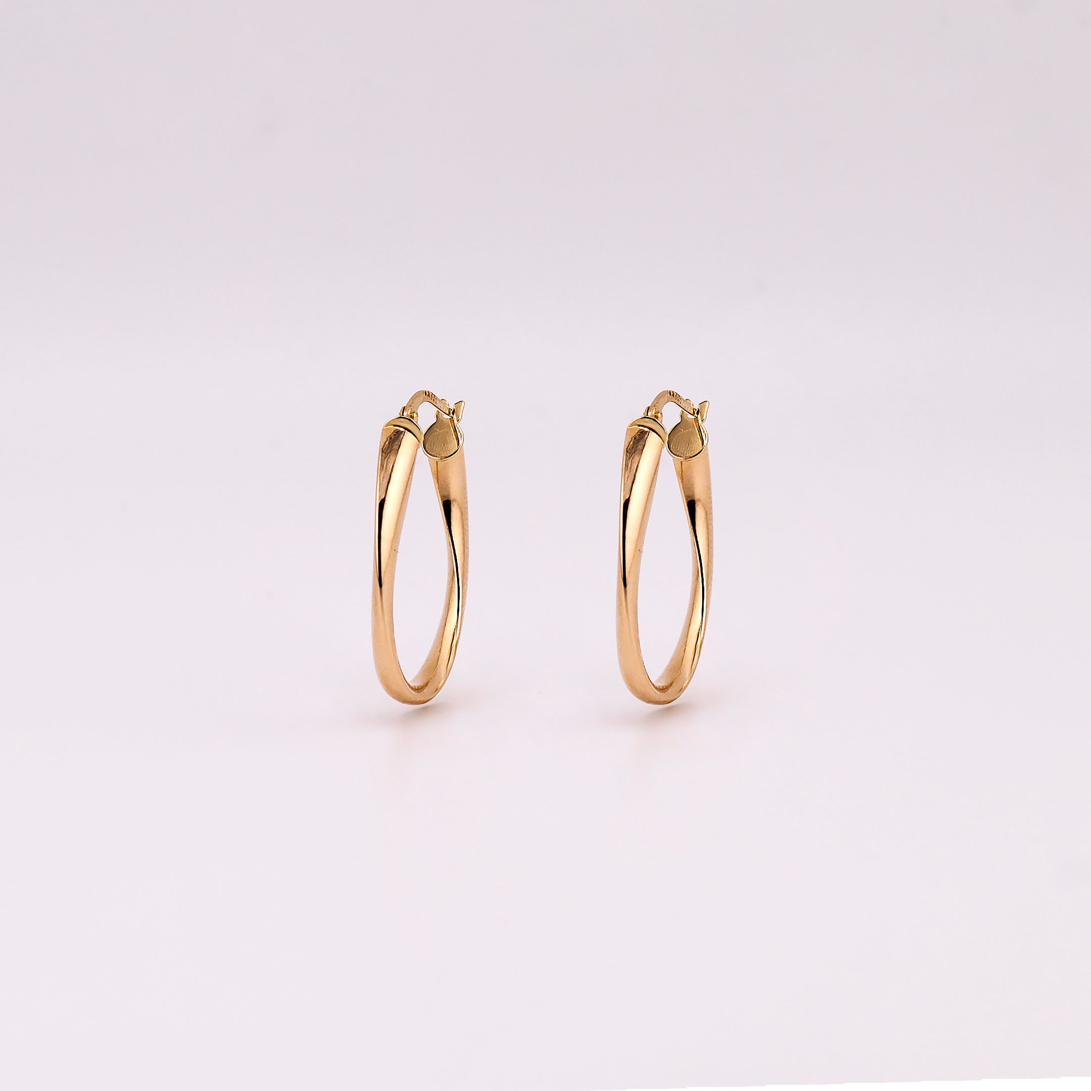 Arracadas Óvalo Torcidas en Oro de 14K